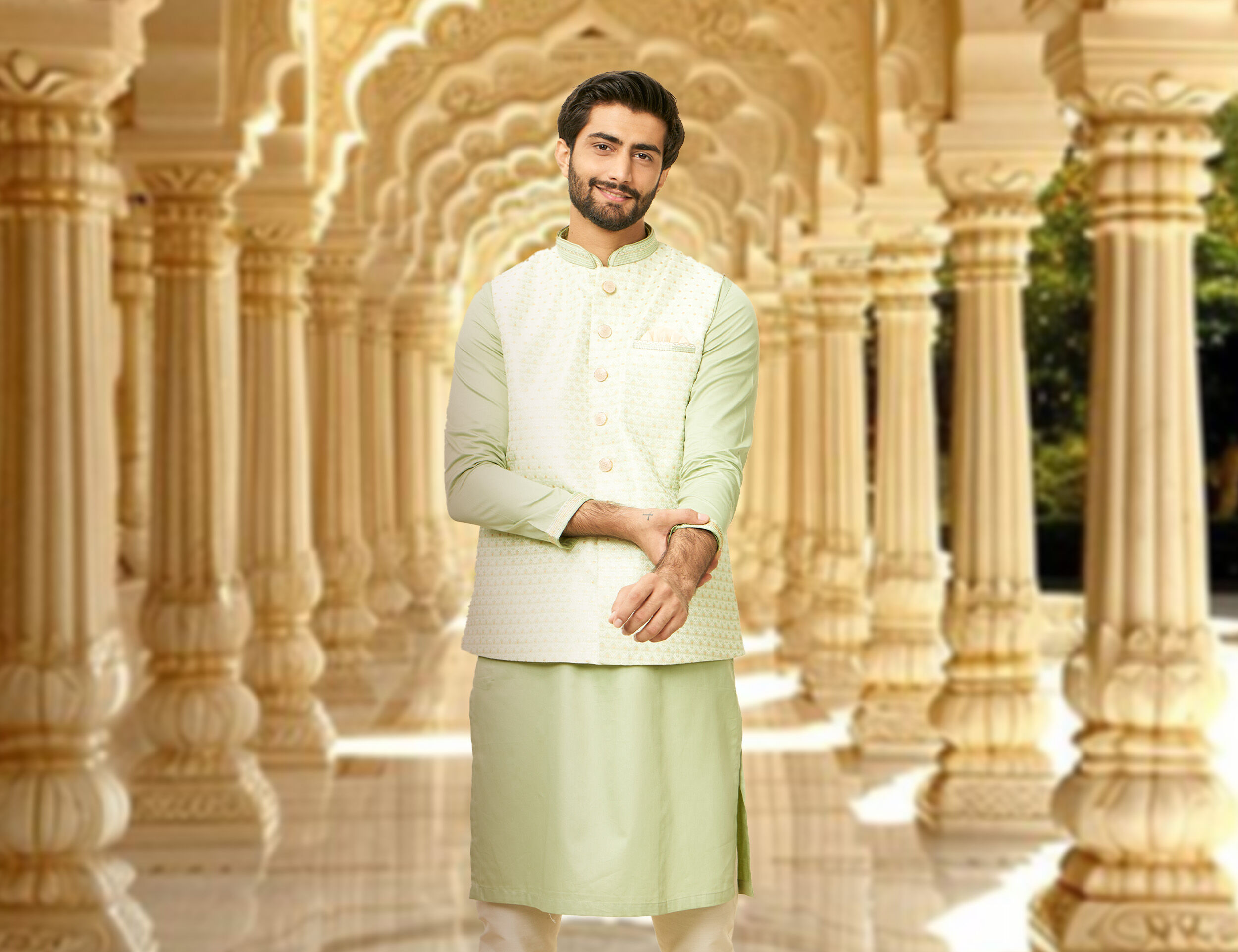 Man in a printed white kurta jacket set
